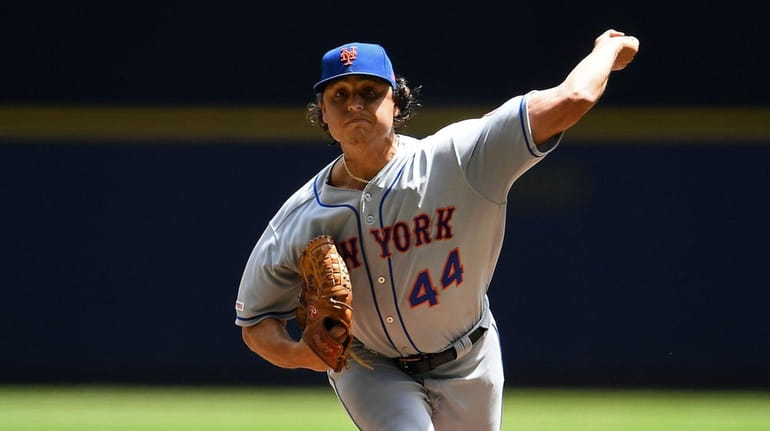 Jason Vargas #44 of the Mets throws a pitch during...