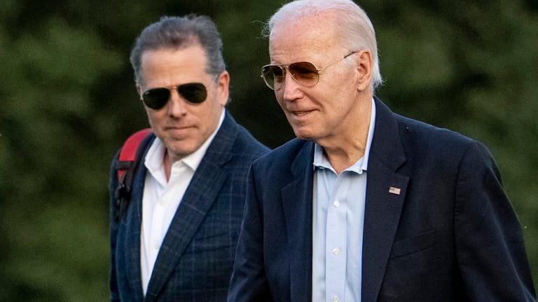 President Joe Biden, and his son Hunter Biden arrive at...