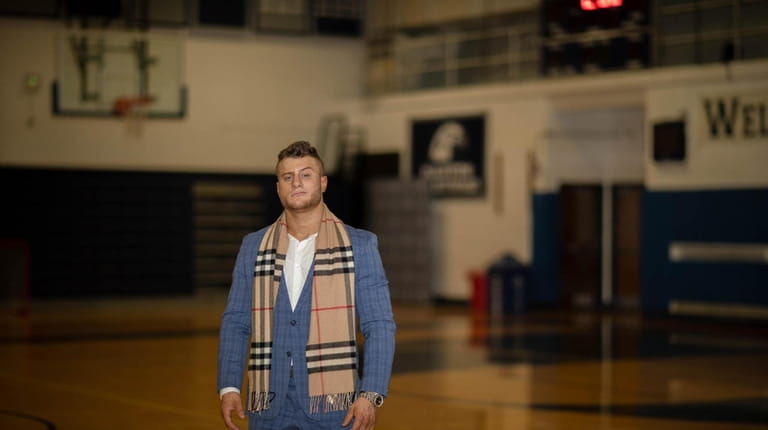 Plainview native Maxwell Jacob Friedman (MJF) reminisces in the gym at Plainview-Old...