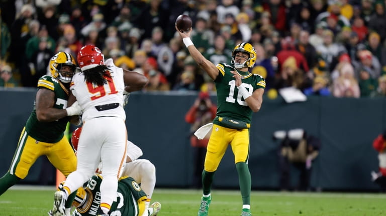 Green Bay Packers quarterback Jordan Love (10) throws against the...