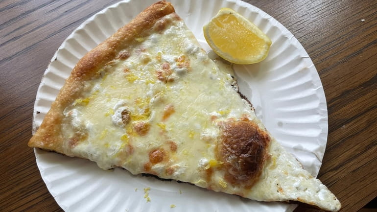 A slice of white pizza at Fini pizzeria in Amagansett.