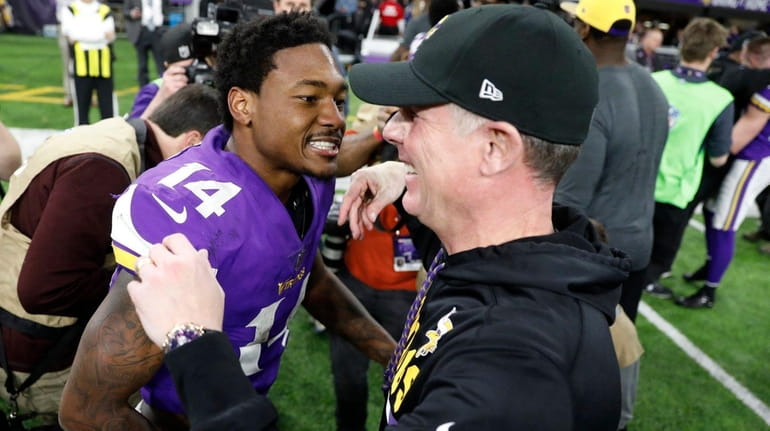 Minnesota Vikings wide receiver Stefon Diggs celebrates with offensive coordinator...