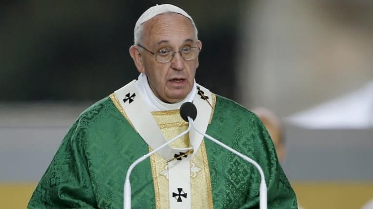 Pope Francis delivers his homily while celebrating Mass Sunday, Sept....