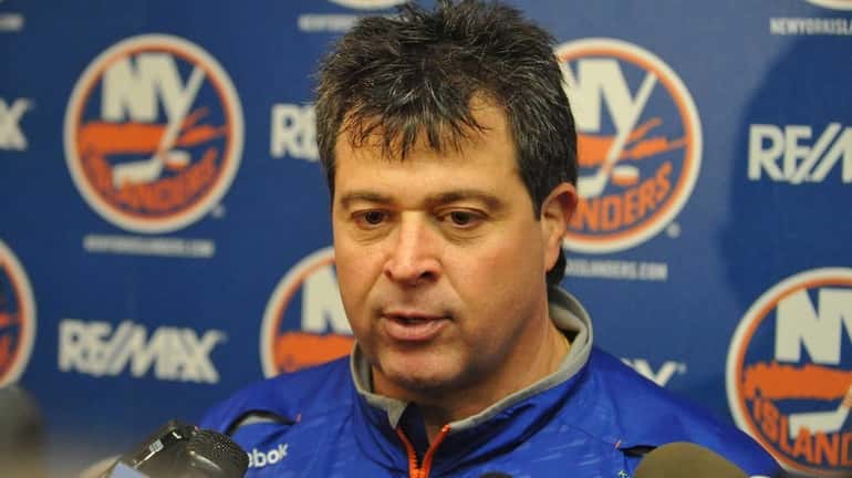 New York Islanders head coach Jack Capuano speaks to the...