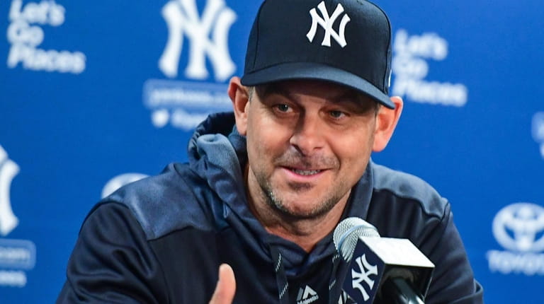 New York Yankees manager Aaron Boone speaks to the media...