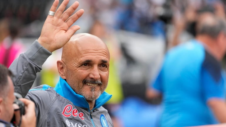 Napoli's head coach Luciano Spalletti wave to fans prior to...