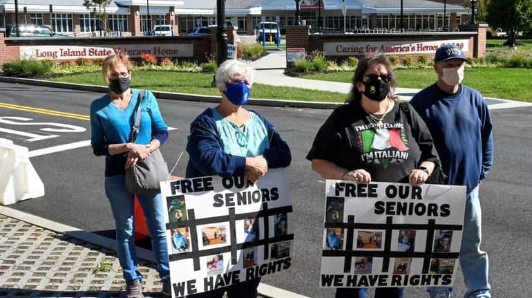 People rally outside the Long Island State Veteran Home in...