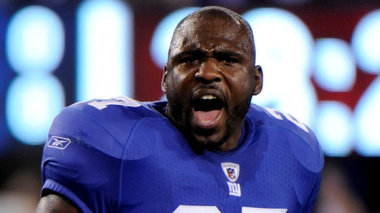 Giants running back Brandon Jacobs  reacts before a game against the Rams on Sept....