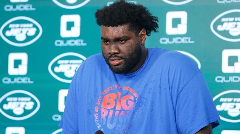 Jets tackle Mekhi Becton answers questions during OTAs at Atlantic...