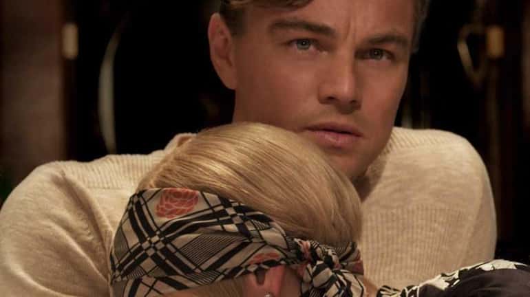 Leonardo DiCaprio as Jay Gatsby and Carey Mulligan as Daisy...