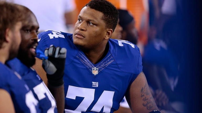 Giants offensive lineman Ereck Flowers on the bench during a...