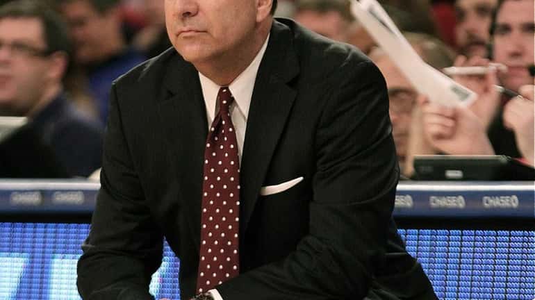 Fordham head coach Tom Pecora looks on during a game...