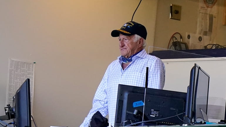 Milwaukee Brewers broadcaster Bob Uecker stands during the seventh inning...
