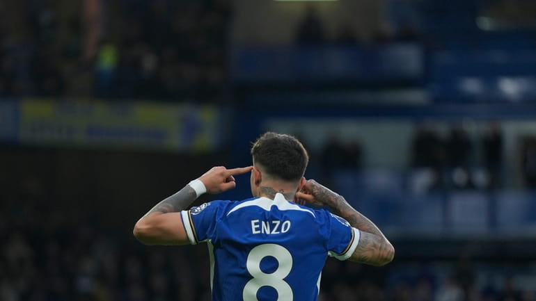 Chelsea's Enzo Fernandez celebrates after he scored his side's third...