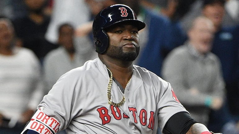 Boston Red Sox designated hitter David Ortiz looks on after...