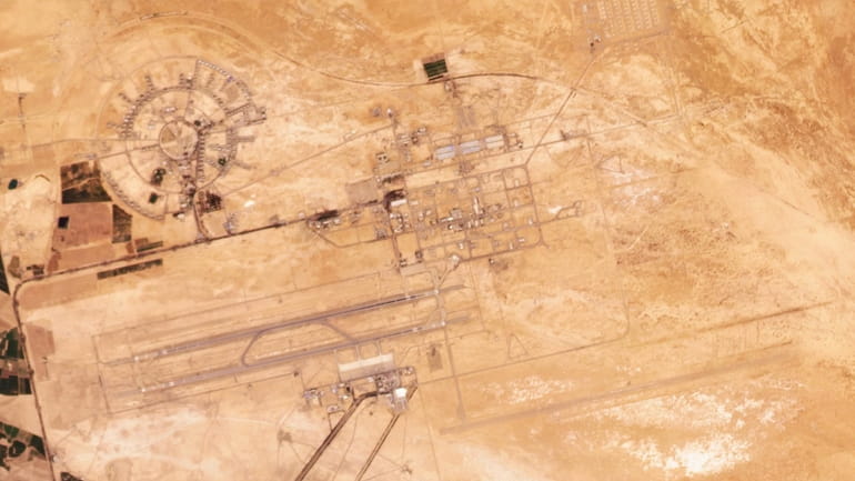 This satellite image shows the dual-use civilian airport and air...