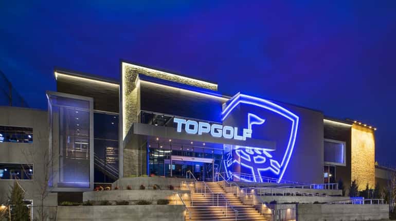 Topgolf is planning to open a driving range and restaurant...