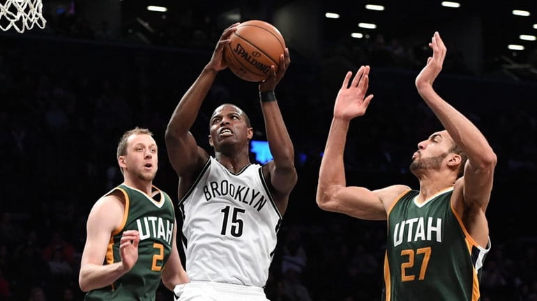 Utah Jazz center Rudy Gobert defends Brooklyn Nets guard Isaiah...