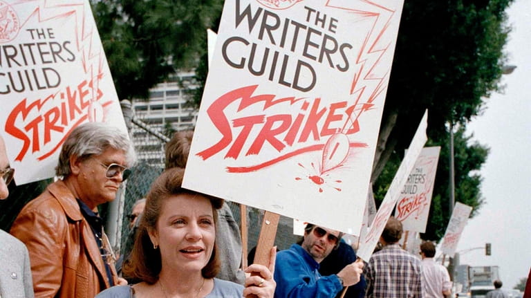 Actor Patty Duke joins striking writers on the picket line...