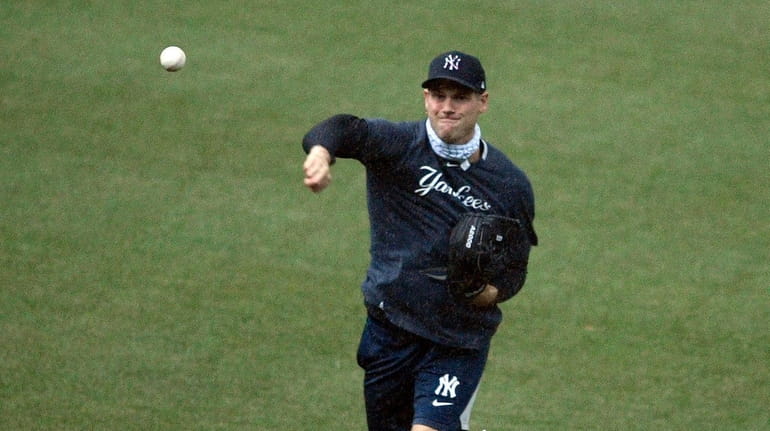 Yankees' Adam Ottavino throws the ball at baseball practice at...
