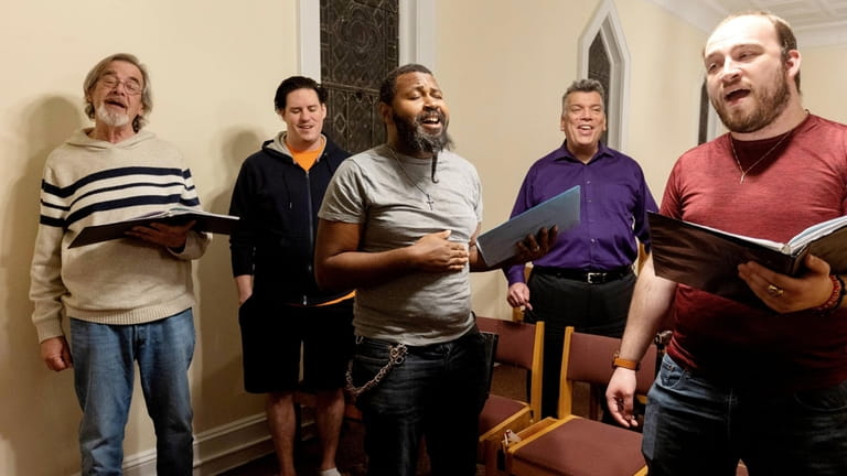 Members rehearse  at St. Paul’s Lutheran Church in East Northport...