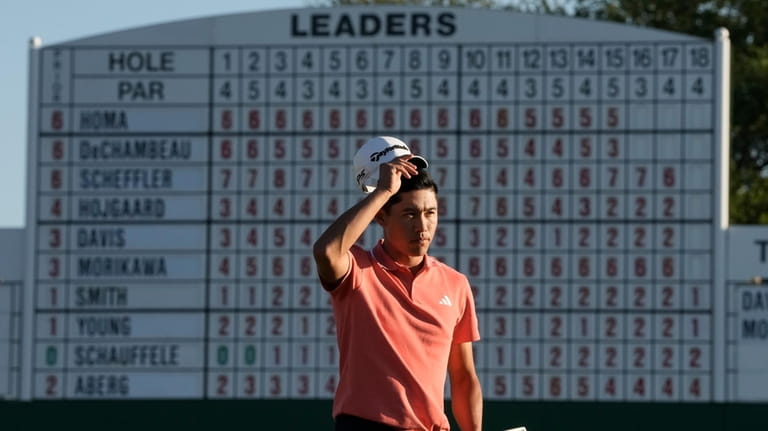Collin Morikawa finishes his third round at the Masters golf...