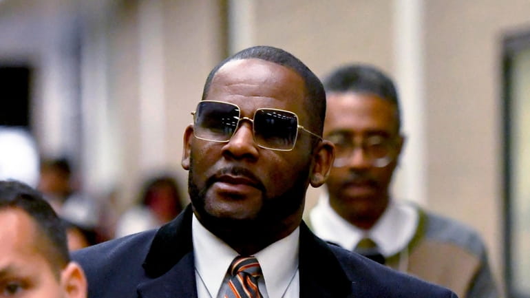 R. Kelly leaves the Daley Center after a hearing in...