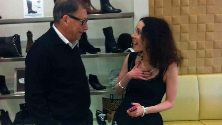 Shoe designer Stuart Weitzman chats with Leslie Liebling-Yardeni of Plainview...