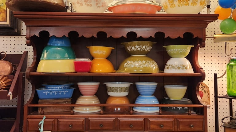 Pyrex bowls and containers at Antique Attics in Lake Grove. 