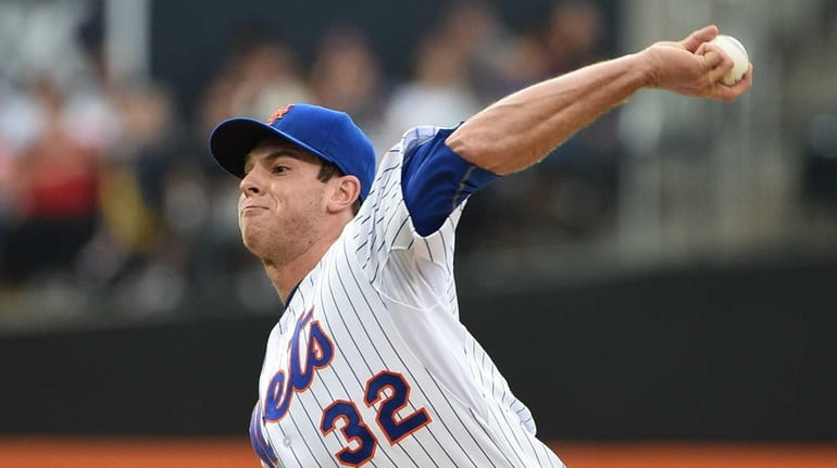 Mets starting pitcher Steven Matz delivers a pitch against the...