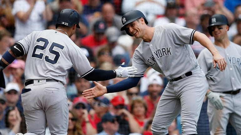 Yankees' Gleyber Torres (25) celebrates his two-run home run that...