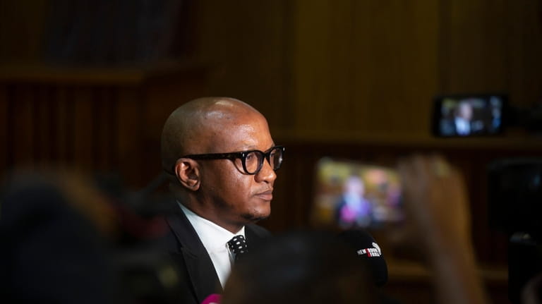 National Prosecuting Authorities' representative Adv.Mthunzi Mhaga addresses the press in...
