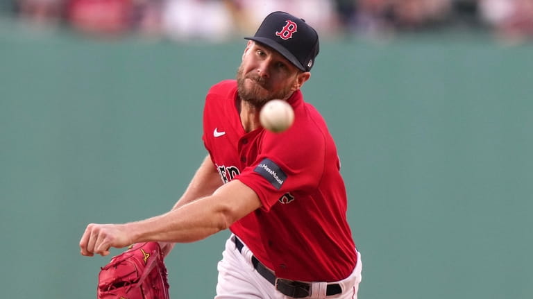 Boston Red Sox's Chris Sale delivers a pitch to a...
