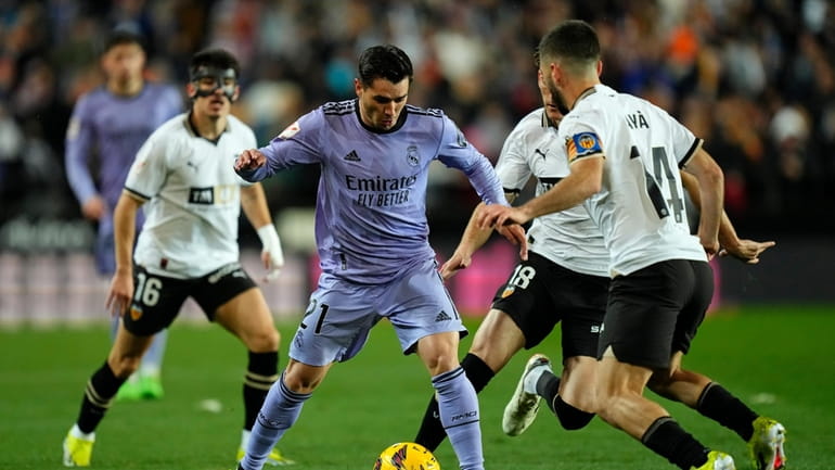 Real Madrid's Brahim Diaz controls the ball during the La...