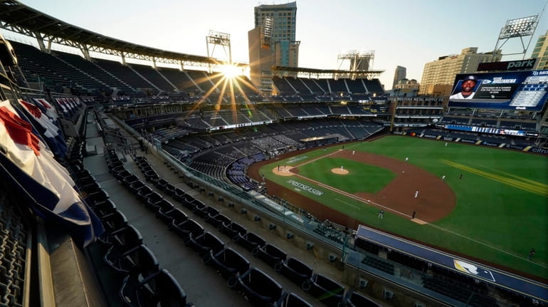The sun sets over Petco Park during the second inning...
