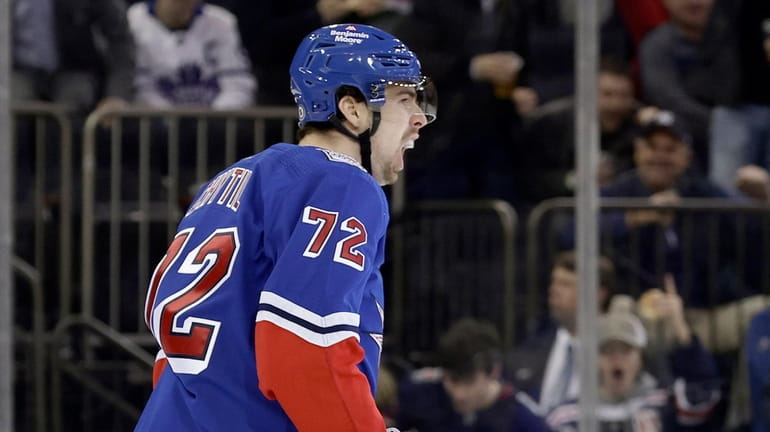 Filip Chytil #72 of the Rangers celebrates his first period...