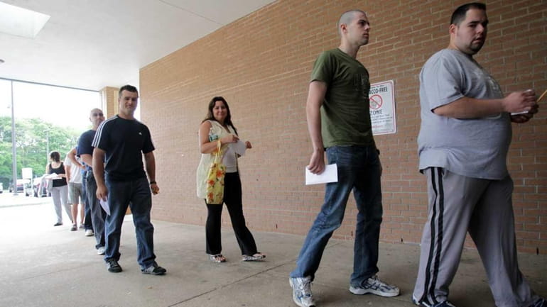 Test takers line up at William Floyd High School early...