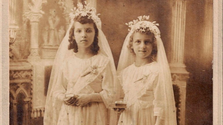 Grace Regina Wingenfeld (right) Communion.