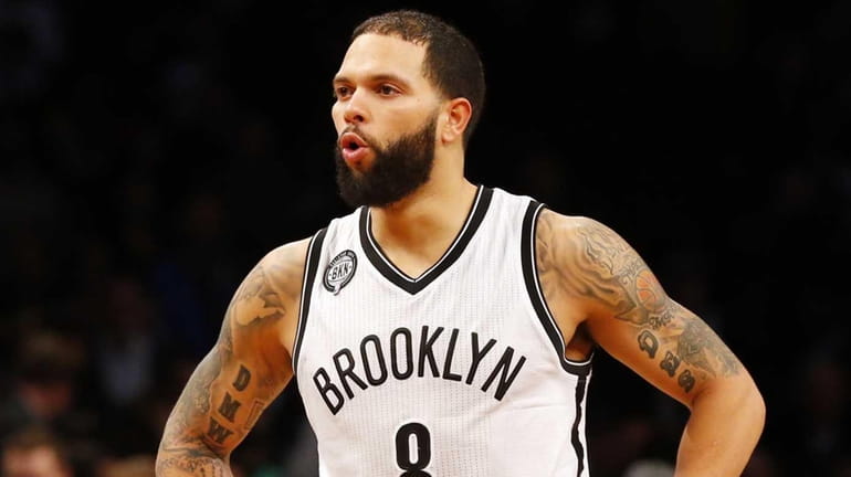 Deron Williams of the Brooklyn Nets looks on late in...