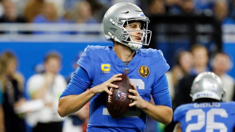 Detroit Lions quarterback Jared Goff looks to throw during the...
