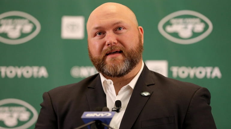 Jets general manager Joe Douglas speaks to the media during...