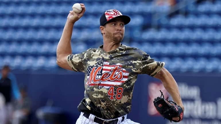 Mets pitcher Jacob deGrom throws on Sunday, July 3, 2022,...