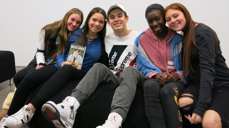 Hayes Grier, center, with Kidsday reporters, from left, Emily Kushner,...