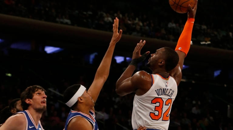 Noah Vonleh #32 of the New York Knicks puts up...