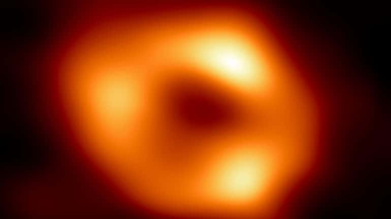 This image released by Event Horizon Telescope Collaboration, Thursday, shows...