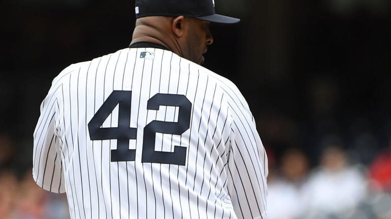 CC Sabathia before he delivers a pitch against the St....