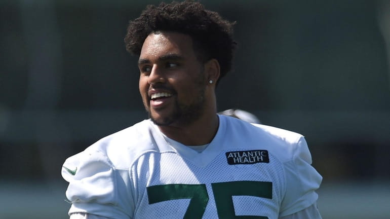 New York Jets rookie offensive guard Alijah Vera-Tucker at training camp on...