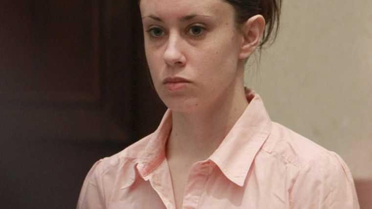 Casey Anthony stands for the entrance of the jury during...