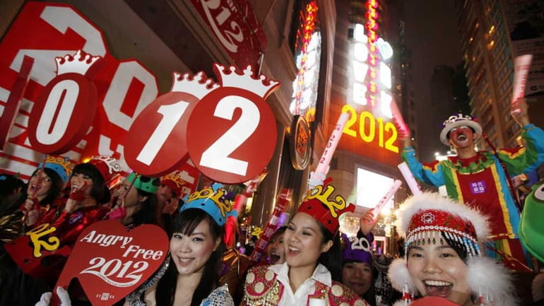 Revelers celebrate the New Year celebrations in Hong Kong's Times...