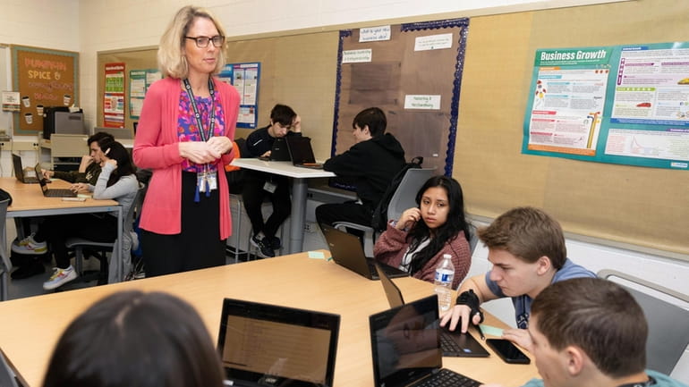 Erica Dzwlewicz teaches the “College Money & Investments" elective at Oceanside...